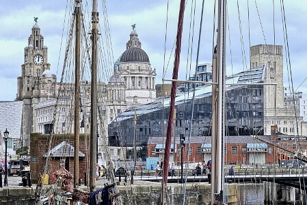 Liverpool waterfront with ship's masts and buildings